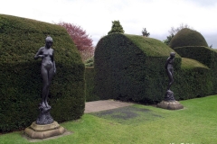 Two-Female-Statues-by-Antonio-Luchessi-at-Chirk-Castle-Wales